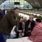 The first residents who were evacuated from toxic red sludge-hit Kolontar village arrive at the temporary shelter set up in the Sports Hall of Ajka, 150 kms west of Budapest.