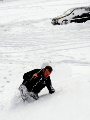 Hopefully Ireland won't need a literal digout unlike this man struggling through a snow drift in Derbyshire, England today