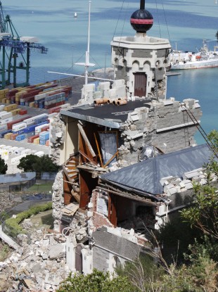 The iconic Time Ball Station stands semi-destroyed following Tuesday's earthquake in Lyttelton on the outskirts of Christchurch, New Zealand