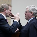 Taoiseach Enda Kenny and Tanaiste Eamon Gilmore compare shadow puppets (possibly) at the launch of a visa waiver programme (Eamonn Farrell/Photocall Ireland)