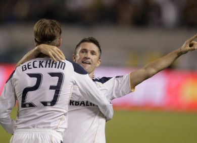 Keane and Beckham celebrate.