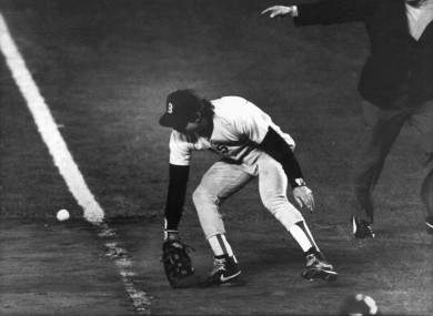 Boston Red Sox first baseman Bill Buckner misplays the ball during Game 6 of the 1986 World Series against the New York Mets.