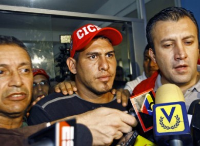 Ramos (centre) after he was found.
