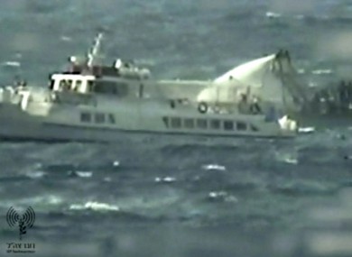 This video image released by the Israeli Defense Ministry on Friday appears to show a military boat hosing water on a civilian boat believed to be one of the two protest boats