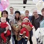 Pictured are, from left, Marie Smith, six-month-old Sarah Rose Nolan, Ciaran Brennan, Nicola Smith, Susan McFarlane, seven-month-old TJ Costello, Ciara McFarlane, Paddy Smith and Gillian Smith from Airfield, Co Dublin welcoming back for Christmas cousins Ciaran, Susan and Nicola from Perth, Australia to Dublin Airport. Photo Mark Stedman/Photocall Ireland