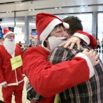 Luke Kelly is welcomed home by his mother Joan Coogan Kelly, father Eamonn and brother Neal (not pictured) after arriving to Dublin Airport from Sydney, Australia, where he has been living for six years. Photo Mark Stedman/Photocall Ireland