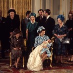 1977 ended with the Queen getting her first grandchild: Princess Anne, who had been the first of her four children to marry (to Captain Mark Phillips in 1973), gave birth to Peter Mark Andrew Phillips. Here the Royals are pictured in the White Drawing Room at Buckingham Palace.