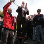 TD Joe Higgins addresses crowds outside the National Staduim in Dublin. (Leon Farrell/Photocall Ireland)
