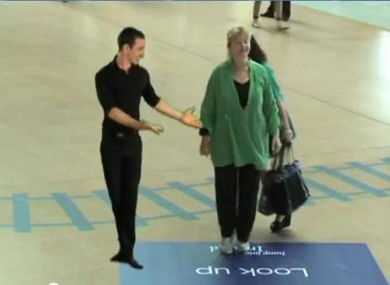 Woman dances with virtual Irish dancer