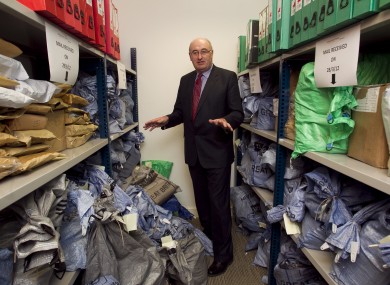 Phil Hogan looking at mailbags filled with household charge registration forms