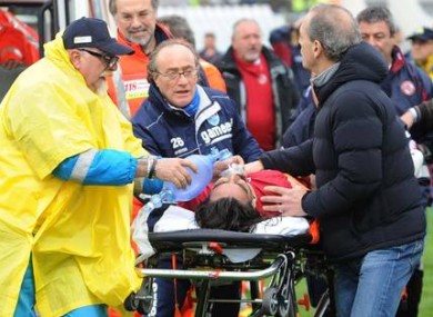 Piermario Morisini of Livorno receives emergency treatment