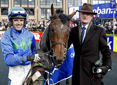 Hurricane Fly is pictured with jockey Ruby Walsh and trainer Willie Mullins following his victory.