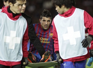 Villa is carried from the pitch in January.