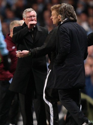 Fergie and Mancini are separated by fourth official Mike Jones.