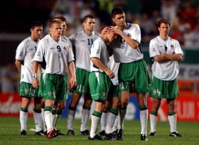 Niall Quinn consoles David Connolly after his missed penalty at the 2002 World Cup.