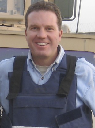 Greg Burke pictured while working in Afghanistan in 2007.