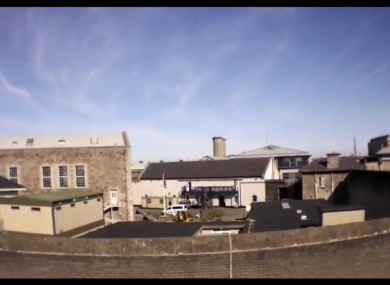 The drone peers over the wall of the Mountjoy Prison complex