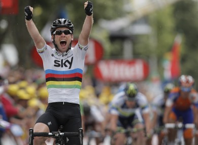 Mark Cavendish celebrates after winning Stage 18.