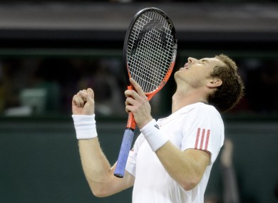Andy Murray celebrates defeating Cyprus's Marcos Baghdatis.