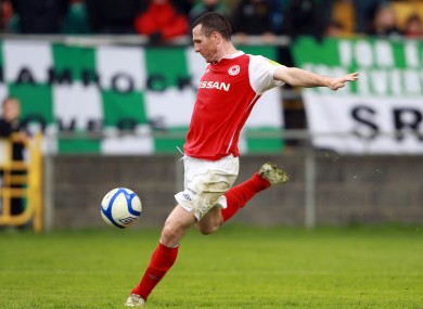 Pat Flynn blasts in the equalising goal for St Pat's.