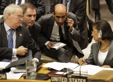 Britain's UN ambassador Mark Lyall Grant speaks with his US counterpart Susan Rice during this afternoon's Security Council meeting.