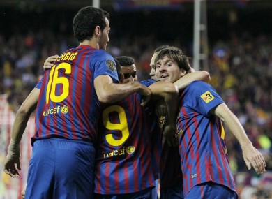Messi celebrates with his Barcelona team-mates.