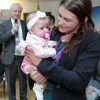 Three-and-a-half month old Anna May Ward from Athenry, Co Galway gets a cuddle from the Olympic champion during today's visit to Our Lady's Children's Hospital Crumlin. (Photo: Mark Stedman/Photocall Ireland)