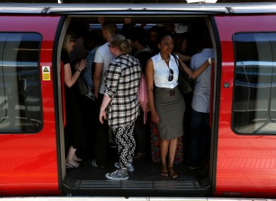 Commuters on an Underground train at Stratford, the main Olympic stop