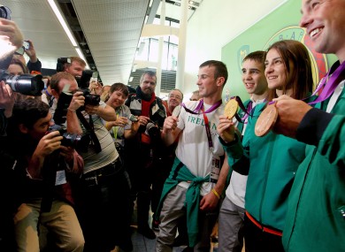 Michael Conlan, second from left, poses with his fellow Olympic medallists John Joe Nevin, Katie Taylor and Cian O'Connor in Dublin Airport.