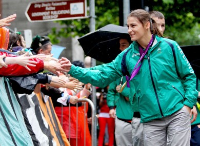 Taylor greets fans.