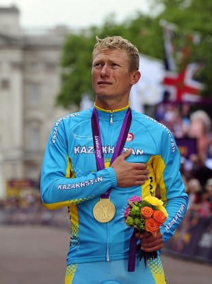 Kazakhstan's Alexander Vinokourov celebrates winning Gold in the Men's Road Race last month.