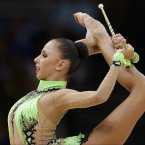Russia's Daria Dmitrieva during the rhythmic gymnastics individual all-around qualifications  at the 2012 Summer Olympics, Friday, Aug. 10, 2012, in London. (AP Photo/Gregory Bull)