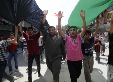 Syrians hold anti-government protest in Aleppo, Syria last week.