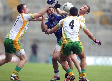 Paul Galvin is challenged by Donegal players during the All-Ireland semi-final.