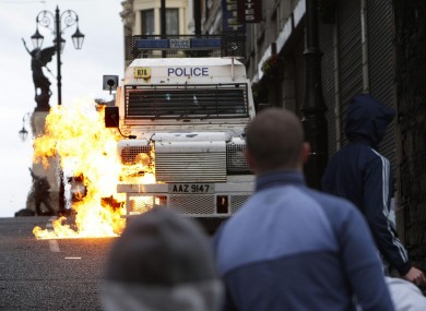 File image of a petrol bomb being thrown at a police van in Derry in August 2008