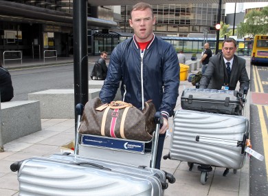 Rooney arriving at Manchester airport this week.
