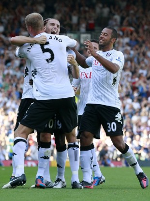 Mladen Petric (second left) celebrates scoring Fulham's second goal.