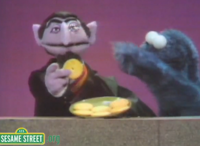 Count von Count with the Cookie Monster in Sesame Street