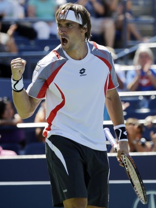 David Ferrer of Spain celebrates during his match today.