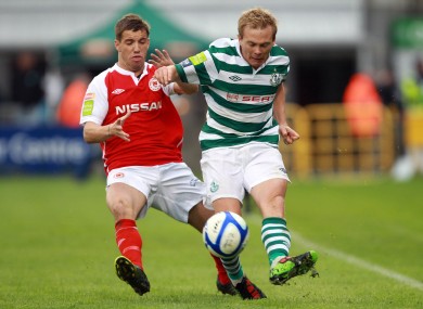 Darren Meenan of Pat's with Conor McCormack of Rovers.