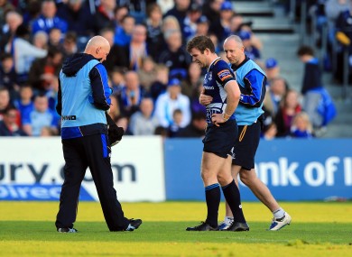 Gordon D'Arcy receives attention following a blow to the ribs.