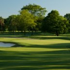 Turning back the other way, this was a blind tee shot for the 1999 USPGA Championship, but now the players have a clear view of a heavily-guarded green that breaks hard from left to right.