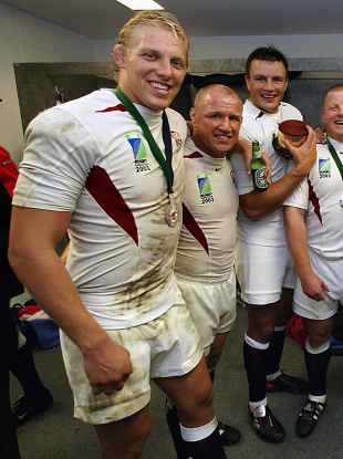 Lewis Moody celebrates with England teammates in 2003.