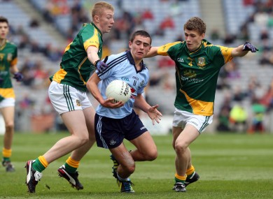 Niall Scully of Dublin with Brian Power and Shane Gallagher of Meath.
