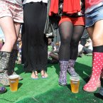 One optimistic fan wears a pair of sandals among the wellies Photo: Laura Hutton/Photocall Ireland