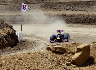 Former Formula One driver David Coulthard pilots the Red Bull Show Car through in testing.