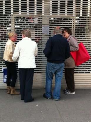 Shoppers outside the closed Guiney and Co. today.