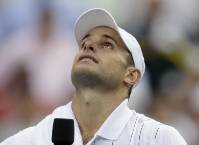 Andy Roddick looks up after loosing to Argentina's Juan Martin Del Potro in the fourth round the 2012 US Open tennis tournament.