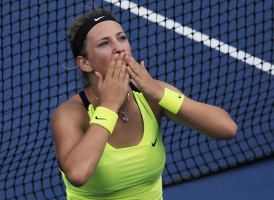 Victoria Azarenka, of Belarus, blows kisses to the crowd after her match against Maria Sharapova, of Russia.