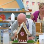 Finishing off their gingerbread houses. 